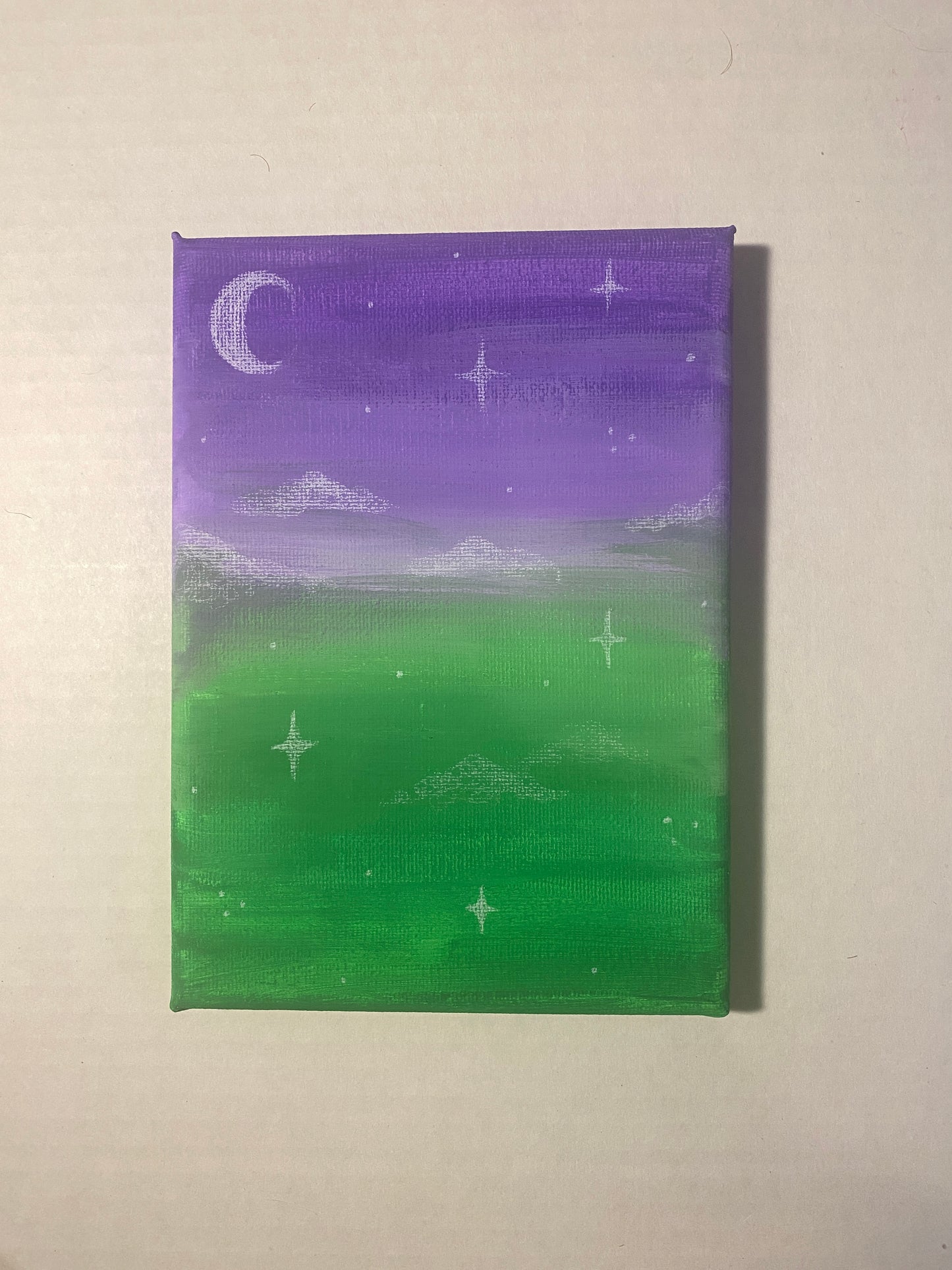 Gradient painting with purple on the top and green on the bottom, with clouds and stars strewn throughout and a cresent moon in the top left corner.